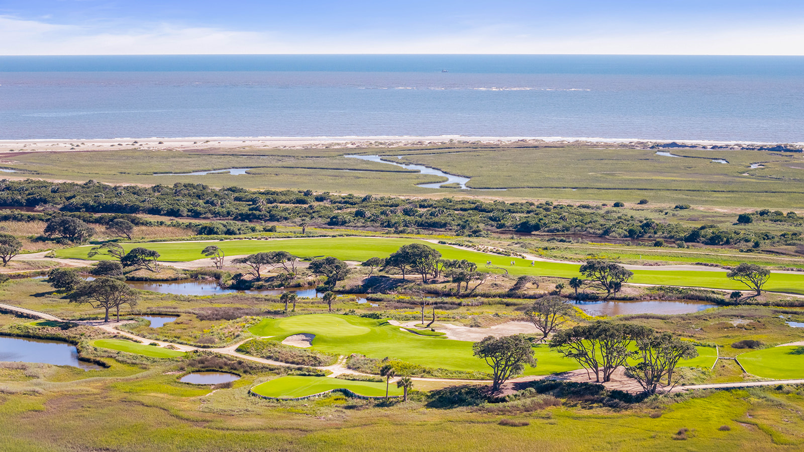 Aerial view of Kiawah Island, SC: golf course, salt marsh, dunes and the Atlantic